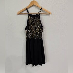 Black and Gold Flirty Cocktail Dress